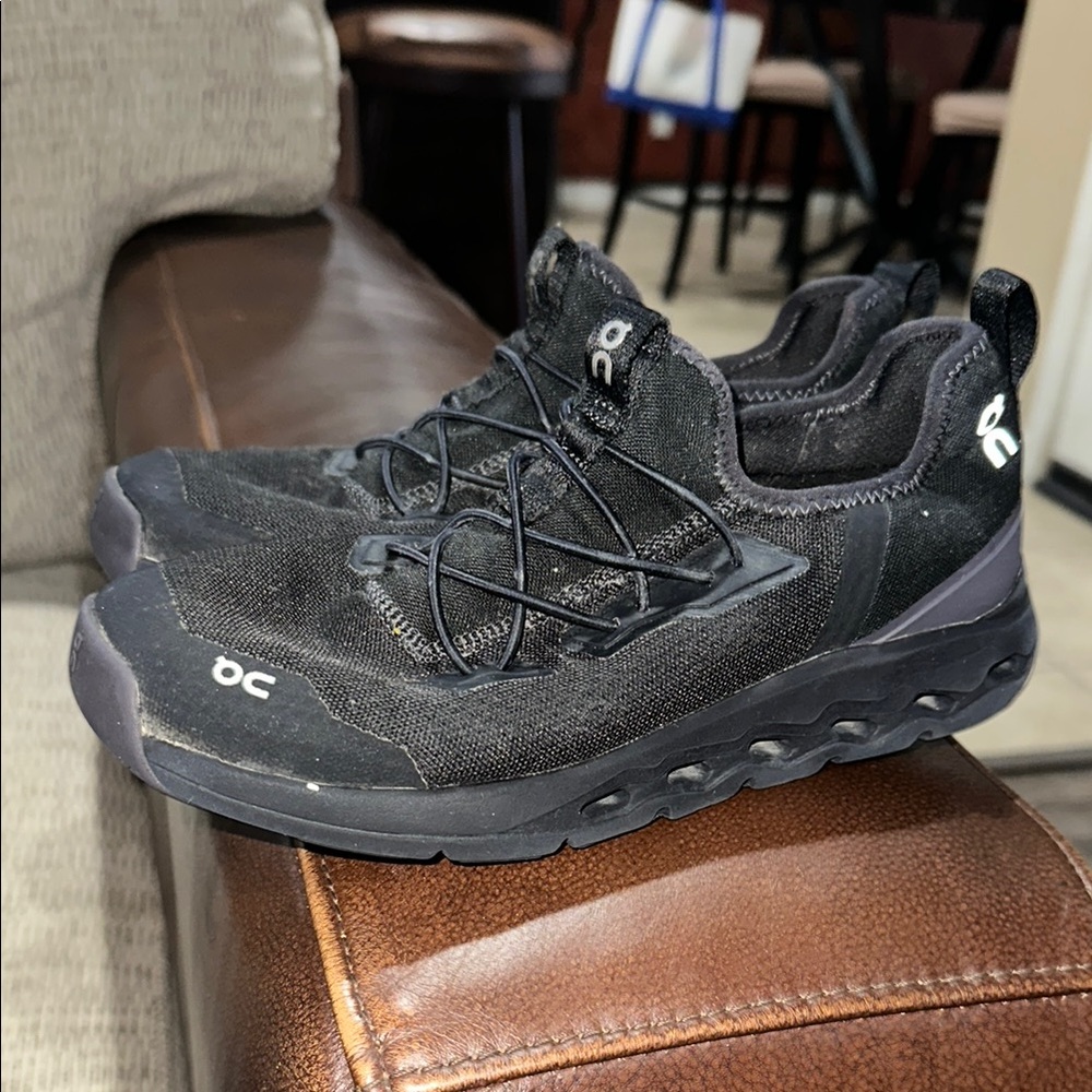 On Running Black Sneakers with CloudTec Cushioning